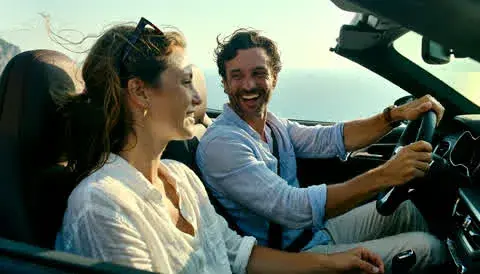 3. Maya and Leo in the car, medium shot